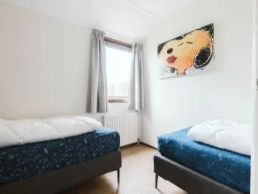 A holiday home where everyone will immediately feel at home. The homely appearance is a mix of modern design and coziness. The house is located in the front section of the popular North Sea Park, but due to its unique location, it offers a lot of pea - Image 5