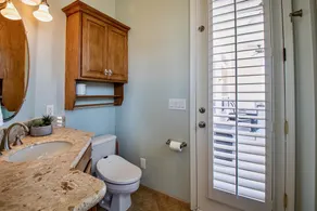 Relax and recharge at this stylish desert retreat with views of rolling desert hills. Enjoy sunsets from the heated pool, dine outdoors, or unwind with a few on the putting green. Perfect for long stays—just 15 minutes from the airport! - Image 4