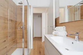 Travel with your family and friends and explore lakes and mountains near Como!This spacious apartment, with two bedrooms, two bathrooms, open space kitchen with island, large living room, small terrace, is located on the road that connects the two main c - Image 4