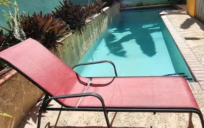 Cozy private room in shared residence with pool - Image 5