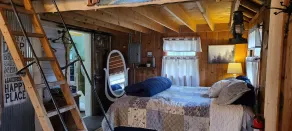 Wood Haven Lodge. Secluded, cozy log cabin in Northern Michigan. - Image 3