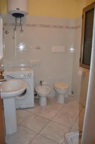 Apartamento de tres habitaciones a 120 metros del mar de San Giovanni di Posada Nuoro Cerdeña Italia - Image 2