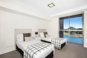 Lakeside Family Oasis with Pool, Gym and Balcony - Image 4