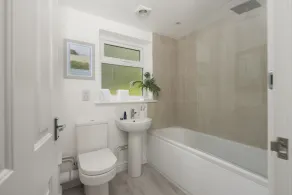 Situated only sixty meters from the Blue Flag sandy beach in the charming coastal village of Porthto - Image 3