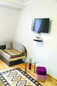 Suite 2 with one double bed with sofa bed - Image 4
