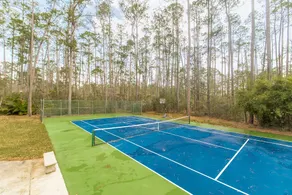 Beautiful waterfront paradise with water access, pool, tennis court. - Image 2