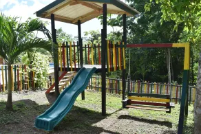 Set in jungle, Wild Orchid is a self catering 2 bedroom cabin with private porch - Image 2