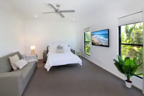Our beachside home offers the perfect mix of coastal charm and modern living! - Image 5