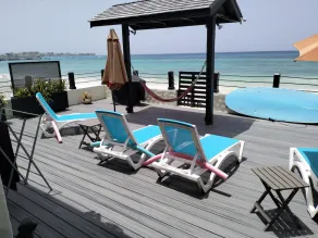 Beachfront 1-Bedroom Hideaway Steps Away From Oistins - Image 5