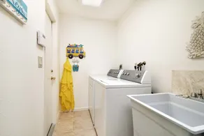 This beauty is centrally located,  with a heated pool and water fall! - Image 2