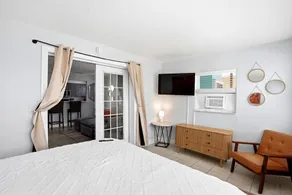 Book NOW to enjoy WATERFRONT views in Indian Rocks Beach intracoastal in this comfortable, renovated 2/1 waterfront condo!  Enjoy the intracoastal in your backyard!  Just a 3 minute WALK to the beach!  Bring your boat!  We provide the paddle boards! - Image 5
