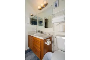 Comfy, Cozy 3-Bedroom Home with Sunroom and Patio - Image 3