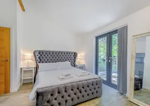 A stunning lodge with a centre lounge. - Image 4