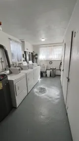 This apartment is located on Main Street in Wellsville NY. - Image 3
