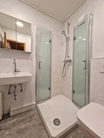 This spacious and nicely furnished apartment on the 1st floor has a balcony. - Image 2
