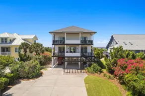 Discover Peace on the Beach, a stunning 6BR, 5BA oceanfront retreat in Oak Island. - Image 5