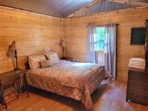 Peaceful cabin in secluded mountain spot beside a picturesque creek - Image 3