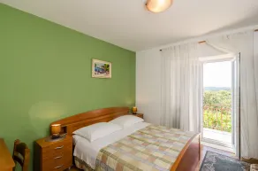 Guesthouse Moretic - Two-Bedroom Suite with Balcony and Sea View - Image 4