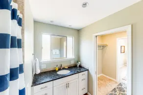Inviting bayside dwelling with beach access, deck, waterfront views, & fireplace - Image 3