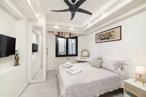 Two bedroom luxury condo with private patio with vineyard & BBQ near beach - Image 2