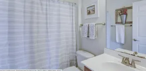 Convenient Lewes location with fenced yard, game room and huge community pool! - Image 3