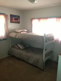 Three bedroom one bath home and 3 1/2 wooded acres - Image 2