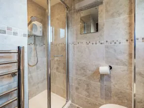 A spacious cottage with a first floor living space boasting far reaching views. - Image 2