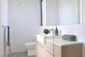 Feel happy and at home here! No stairs. Modern designer space. Heating and cooling throughout. Secure double garage. Keyless entry. Free child friendly amenities including portacot, highchair & toys. No parties, for quiet residential use only. - Image 5