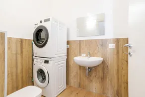 Travel with your family and friends and explore lakes and mountains near Como!This spacious apartment, with two bedrooms, two bathrooms, open space kitchen with island, large living room, small terrace, is located on the road that connects the two main c - Image 2