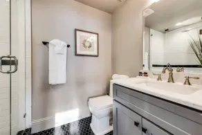Located in the Munger Place Historic District, this remodeled gem blends timeless elegance with modern comfort. Accommodates guests with a cozy queen-size bed, luxury linens, leather sofa, high-speed internet, and top-tier appliances. - Image 5