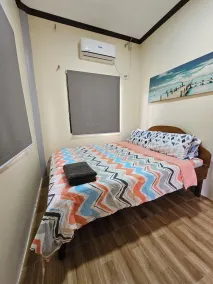 Cozy 2BR home, Netflix, Starlink wifi,AC, h&c shower, and secured parking - Image 5