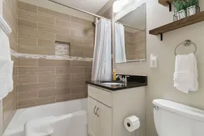 Stunning Home Situated on Quiet a Tree Lined Street - Image 4