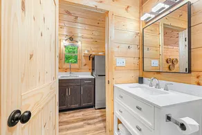 Cabin #8: Studio style layout with kitchenette and a large gravel parking pad beside the cabin for easy boat or trailer storage. - Image 2