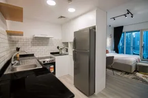Canal-Side Charm: Studio living at Dubai Arch - Image 5