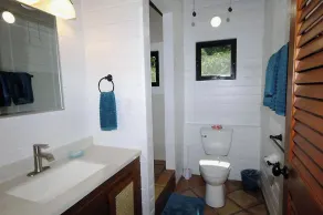 Escape to \"Over the Rainbow\" – your own private Caribbean cottage complete with a private pool, ocean view, and a/c. Experience tranquility in a stunning tropical paradise. Book your dream getaway today! - Image 2