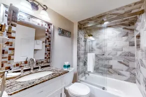 Renovated, dog-friendly condo near beach with balcony, pool & tennis - Image 4