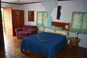 Set in jungle, Wild Orchid is a self catering 2 bedroom cabin with private porch - Image 4