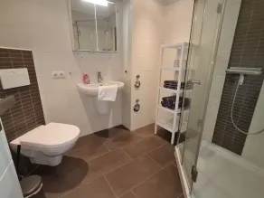 Modern city apartment with balcony and private parking space in a quiet location - Image 2