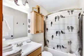Custom home with balcony, radiant floor heating & washer/dryer - Image 4