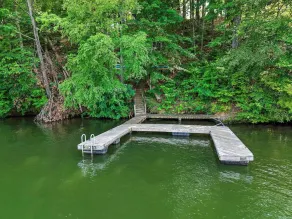 Main Channel-Lots of Water-PickleBall-Hot Tubs-Fire Pits-2 Private Docks. Exclusive use of all 5 log homes, 8 acres, 1300 ft shoreline. Sleeps 36. 1400 sq ft venue, events to 75 (fee applies): weddings, reunions, retreats, milestones. 4.9★ Superhost - Image 2