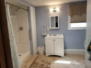 Open concept 2 bedroom ranch with attached garage and deck - Image 3