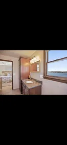 Waterfront Home with Spacious Deck and 4 Bedrooms - Image 4