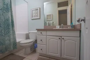 Nice and cozy home is just a short walk to the beach and pool! - Image 4