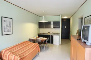 Two-room apartment for 4 people consisting of a living room with kitchenette, double or twin sofa bed, a double bedroom; bathroom with shower. <br>They can be on the ground floor or first floor. <br>Balcony or garden equipped with table and chairs. <br>C - Image 4