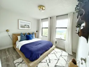 embrace nature in this bright home that has gorgeous views to the lake & forest - Image 5