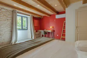 Castelneuve is a private home with a luxurious appearance and pool - Image 3