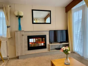 Lotus 2 bedroom dog friendly caravan with veranda offers a stunning sea view. - Image 2