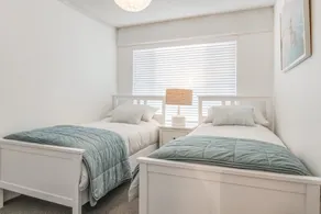 Sleek, modern and comfortable, this is a beautifully appointed apartment. - Image 4