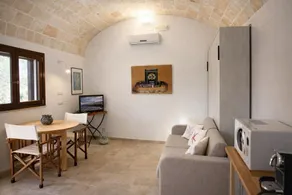 Casina Matilde is a charming retreat carved into an ancient tuff quarry, with walls that tell stories from distant times. This gem, featuring its characteristic barrel vaults, offers a bright furnished veranda for moments of pure stillness, a spacious ro - Image 4