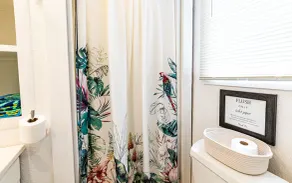Oceanfront in Hilo Hale Kai Suites- Pele Suite - King Bed, Living Room, Bath - Image 2